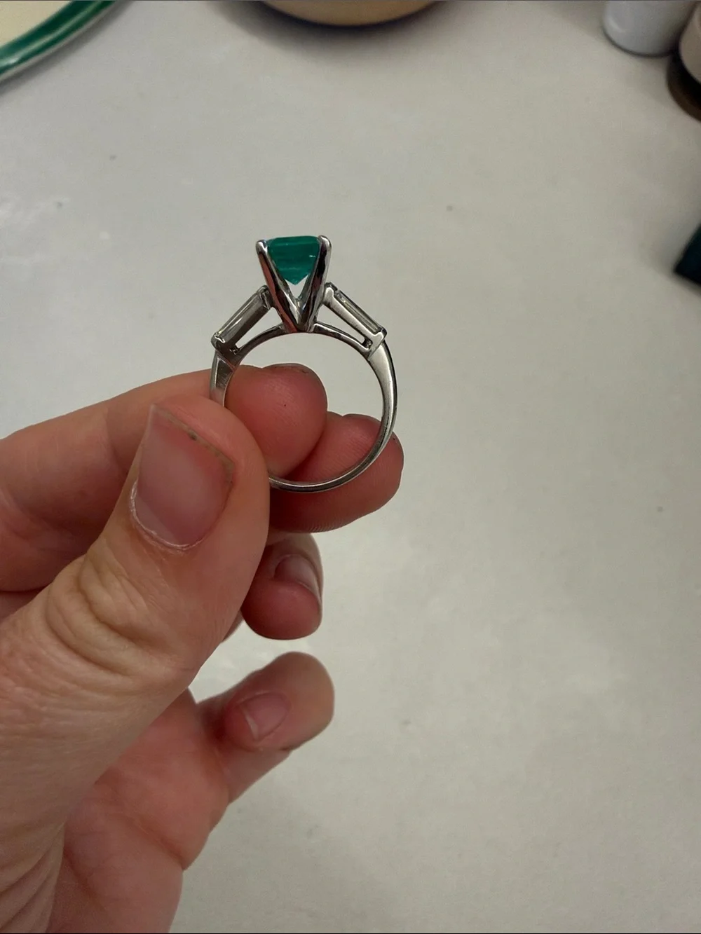 Platinum 2.54 carat Brazilian emerald ring with diamond accents
